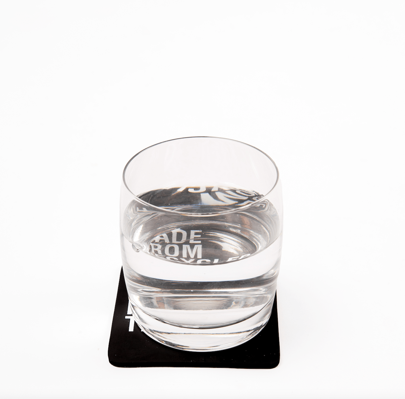 Coaster made from recycled tires